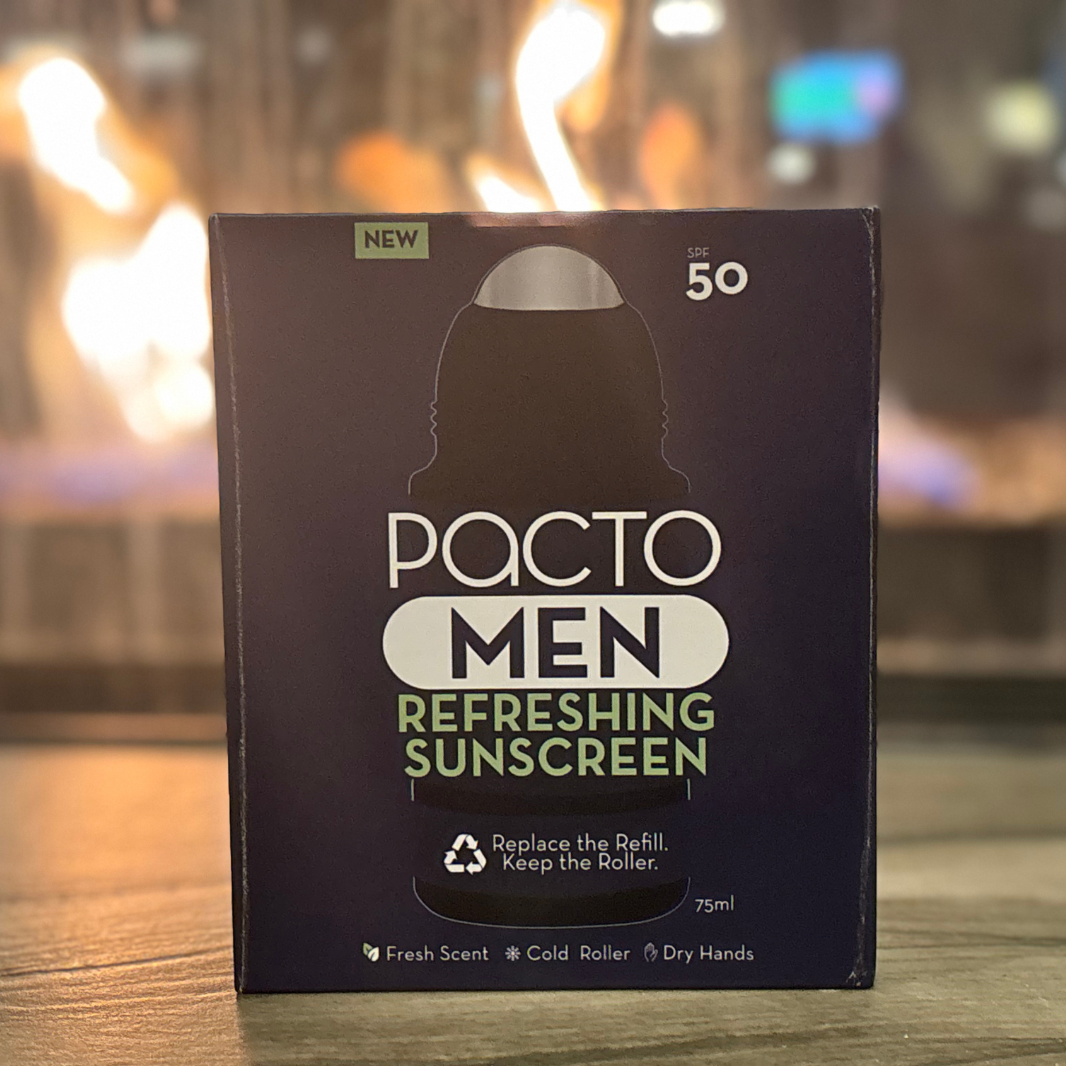 Pacto Men refreshing sunscreen packaging on a chimeney comfort home